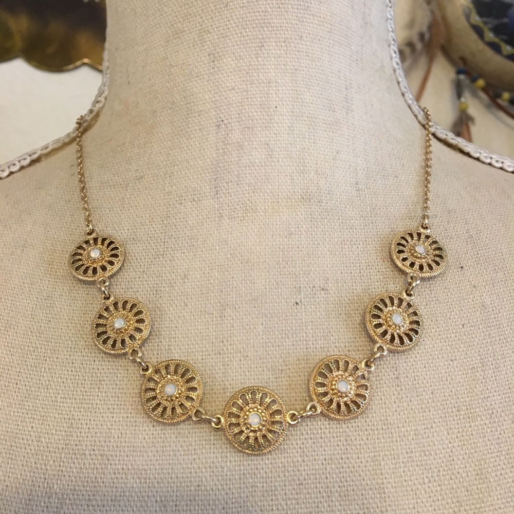 Double sided filigree gold tone medallion necklace